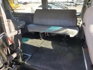 2002 Ford Econoline Passenger XL with VIN 1FMRE11LX2HB04681, listed as a Copart auction lot 60885454 with 114,665 mi miles and Salvage title. Bid and sale history available at DreamBid. Image 11.