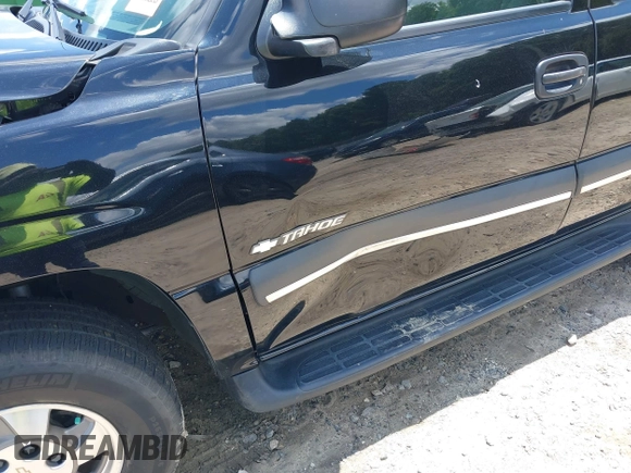 2003 Chevrolet Tahoe LS with VIN 1GNEC13V03R315463, listed as a IAAI auction lot 42518427 with 155,629 mi miles and . Bid and sale history available at DreamBid. Image 18.