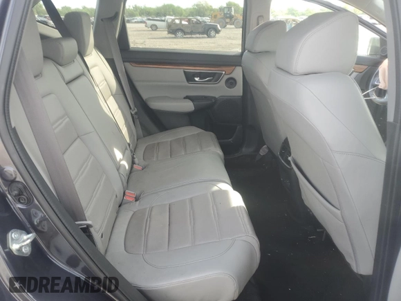 2018 Honda CR-V Touring z VIN 7FARW2H94JE077885, wystawiony jako Copart lot #55451345 z przebiegiem 133 964 mil mil oraz Szkoda całkowita • Salvage title. Historia ofert i sprzedaży dostępna na DreamBid. Obrazek 10.
