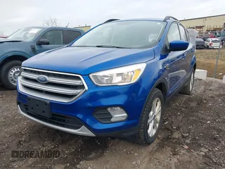 2017 Ford Escape SE with VIN 1FMCU9GD9HUE11122, listed as a IAAI auction lot 39049615 with 130,865 mi miles and . Bid and sale history available at DreamBid. Image 2.