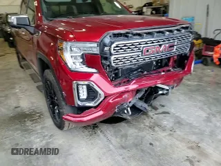 2021 GMC Sierra 1500 Denali z VIN 1GTU9FET0MZ410425, wystawiony jako Copart lot #52823795 z przebiegiem 47 222 mil mil oraz Szkoda całkowita • Salvage title. Historia ofert i sprzedaży dostępna na DreamBid. Obrazek 11.