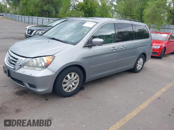 2009 Honda Odyssey EX-L with VIN 5FNRL38629B033203, listed as a IAAI auction lot 42172416 with 261,270 mi miles. Bid and sale history available at carsss.com. Image 2.