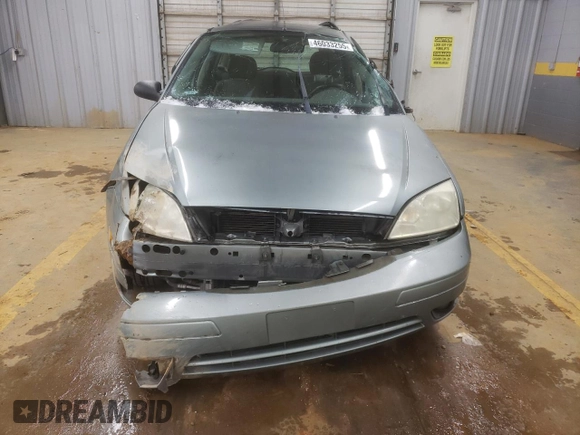 2005 Ford Focus SE with VIN 1FAFP36N65W207075, listed as a Copart auction lot 46033255 with 106,343 mi miles and Salvage Title. Bid and sale history available at carsss.com. Image 5.