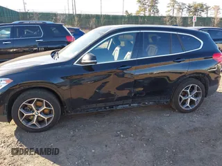 2018 BMW X1 xDrive28i with VIN WBXHT3C36J5L29746, listed as a IAAI auction lot 41547100 with 103,420 mi miles and . Bid and sale history available at DreamBid. Image 6.