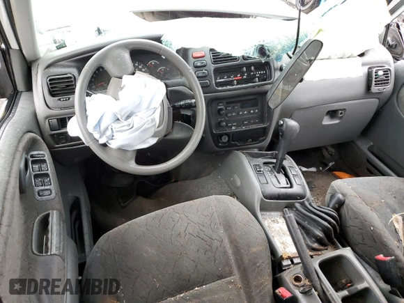 2002 Chevrolet Tracker ZR2 с VIN 2CNBJ734726925605, выставлен на аукционе Copart как лот 60070915 с пробегом Не указан миль и Списание • Salvage title. История ставок и продаж доступна на DreamBid. Изображение 8.