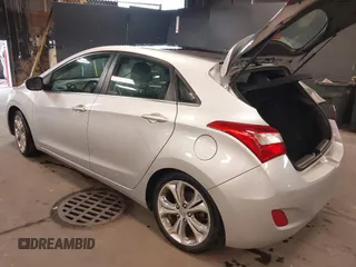 2013 Hyundai Elantra GT with VIN KMHD35LE2DU105677, listed as a IAAI auction lot 42027623 with 137,063 mi miles. Bid and sale history available at carsss.com. Image 3.