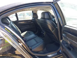 2012 BMW 7 Series 750i with VIN WBAKA8C50CCY37892, listed as a IAAI auction lot 42080313 with 148,058 mi miles. Bid and sale history available at carsss.com. Image 8.