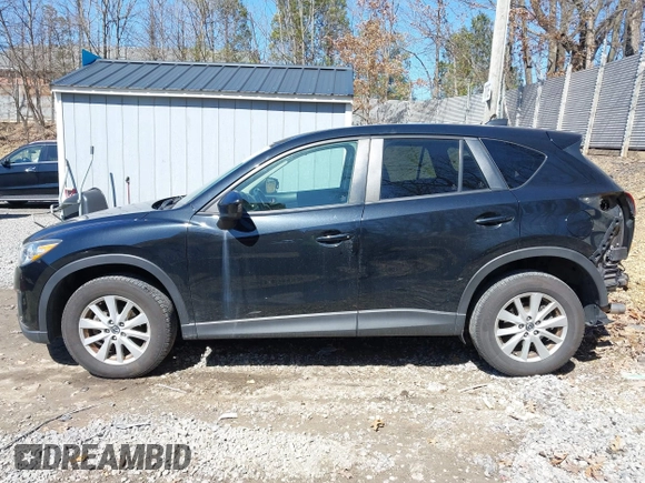 2014 Mazda CX-5 Touring with VIN JM3KE4CY8E0333029, listed as a IAAI auction lot 41857199 with 218,887 mi miles. Bid and sale history available at carsss.com. Image 14.