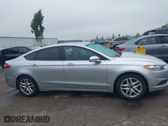 2016 Ford Fusion SE z VIN 3FA6P0H76GR385328, wystawiony jako IAAI lot #42408631 z przebiegiem 127 293 mil mil oraz . Historia ofert i sprzedaży dostępna na DreamBid. Obrazek 13.