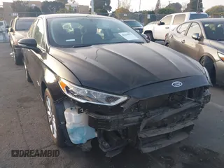 2018 Ford Fusion Energi SE with VIN 3FA6P0PU7JR232567, listed as a IAAI auction lot 41219232 with 54,049 mi miles. Bid and sale history available at carsss.com. Image 1.
