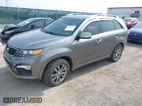 2013 Kia Sorento SX with VIN 5XYKWDA23DG415747, listed as a IAAI auction lot 41995757 with 165,894 mi miles. Bid and sale history available at carsss.com. Image 2.