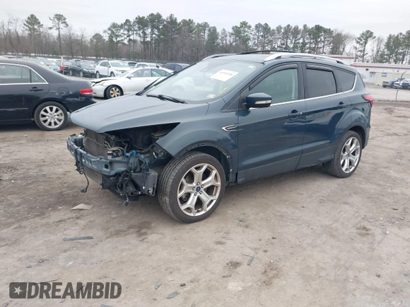 2019 Ford Escape Titanium with VIN 1FMCU9J93KUB84831, listed as a IAAI auction lot 41514146 with 105,072 mi miles. Bid and sale history available at carsss.com. Image 2.