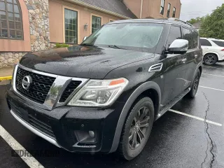 2017 Nissan Armada Platinum z VIN JN8AY2NE7H9701305, wystawiony jako Copart lot #58612425 z przebiegiem 185 502 mil mil oraz Czysty tytuł • Clean title. Historia ofert i sprzedaży dostępna na DreamBid. Obrazek 1.