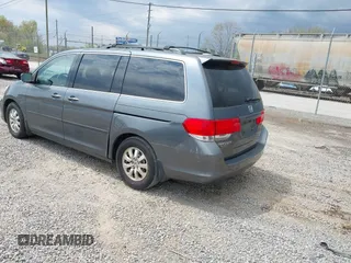2010 Honda Odyssey EX-L with VIN 5FNRL3H68AB039883, listed as a IAAI auction lot 42000686 with 231,642 mi miles. Bid and sale history available at carsss.com. Image 3.