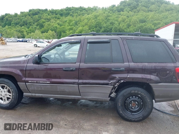 2004 Jeep Grand Cherokee Laredo z VIN 1J4GW48S94C209326, wystawiony jako IAAI lot #42309565 z przebiegiem 159 429 mil mil oraz . Historia ofert i sprzedaży dostępna na DreamBid. Obrazek 14.