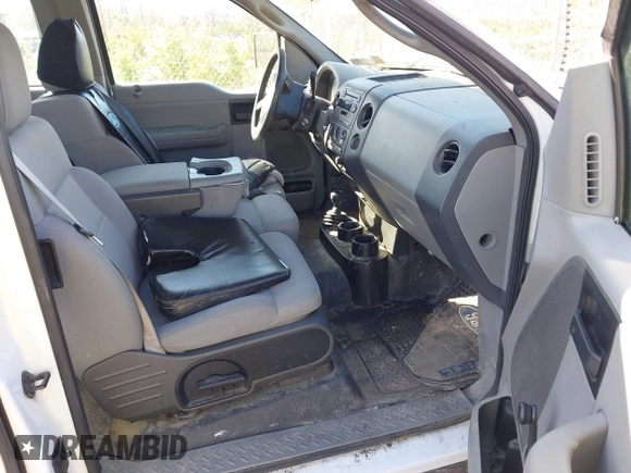 2005 Ford F-150 STX with VIN 1FTRX14W95FB53021, listed as a IAAI auction lot 42138458 with 150,885 mi miles. Bid and sale history available at carsss.com. Image 5.