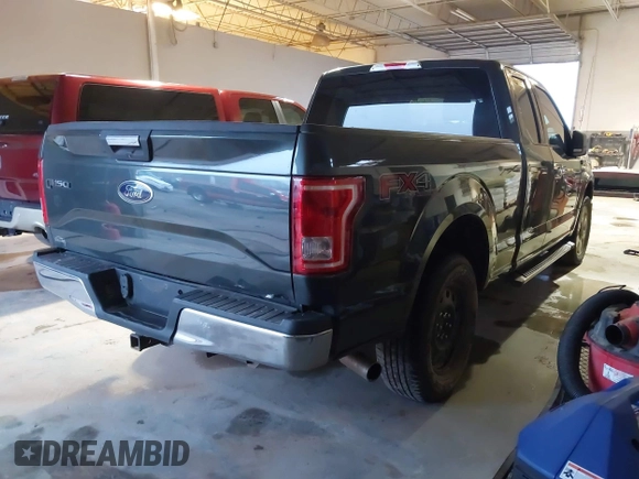 2015 Ford F-150 XLT with VIN 1FTEX1EP3FKE57475, listed as a IAAI auction lot 41435394 with 233,560 mi miles. Bid and sale history available at carsss.com. Image 4.