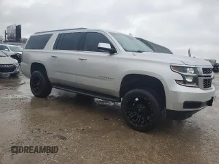 2016 Chevrolet Suburban LT with VIN 1GNSKHKC1GR257416, listed as a Copart auction lot 80993814 with 142,470 mi miles and Salvage Title. Bid and sale history available at DreamBid. Image 4.