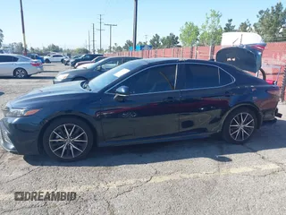 2021 Toyota Camry SE Nightshade with VIN 4T1T11AKXMU430841, listed as a IAAI auction lot 42019485 with 124,561 mi miles. Bid and sale history available at carsss.com. Image 15.
