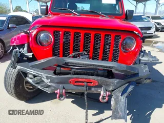 2022 Jeep Gladiator Willys Sport z VIN 1C6HJTAG0NL180848, wystawiony jako IAAI lot #41778129 z przebiegiem Nie podano mil oraz . Historia ofert i sprzedaży dostępna na DreamBid. Obrazek 19.