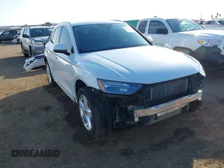 2024 Audi Q5 S line Premium Plus z VIN WA1E2AFY0R2070483, wystawiony jako IAAI lot #41450908 z przebiegiem 12 881 mil mil oraz . Historia ofert i sprzedaży dostępna na DreamBid. Obrazek 1.