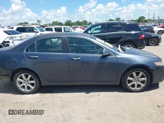 2005 Acura TSX with VIN JH4CL96805C035339, listed as a IAAI auction lot 42587430 with 212,221 mi miles and . Bid and sale history available at DreamBid. Image 14.