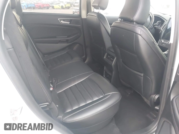 2024 Ford Edge SEL z VIN 2FMPK4J90RBA77889, wystawiony jako IAAI lot #42484303 z przebiegiem 51 211 mil mil oraz . Historia ofert i sprzedaży dostępna na DreamBid. Obrazek 8.