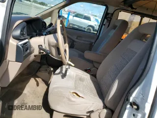 1997 Ford Aerostar z VIN 1FMDA11U5VZC07035, wystawiony jako Copart lot #47953635 z przebiegiem 92 966 mil mil oraz Szkody całkowita. Historia ofert i sprzedaży dostępna na DreamBid. Obrazek 7.