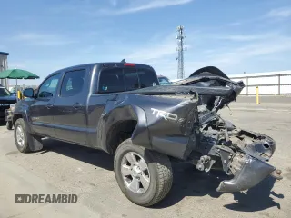 2015 Toyota Tacoma with VIN 3TMMU4FN7FM078006, listed as a Copart auction lot 59129495 with 244,062 mi miles and Salvage title. Bid and sale history available at DreamBid. Image 2.