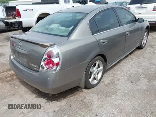 2006 Nissan Altima SE z VIN 1N4BL11D46N322200, wystawiony jako IAAI lot #42131619 z przebiegiem 248 538 mil mil oraz . Historia ofert i sprzedaży dostępna na DreamBid. Obrazek 4.