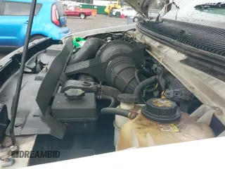 2010 Ford Econoline Cargo Commercial with VIN 1FTNE1EW7ADA91742, listed as a IAAI auction lot 43299094 with 267,597 mi miles and . Bid and sale history available at DreamBid. Image 12.