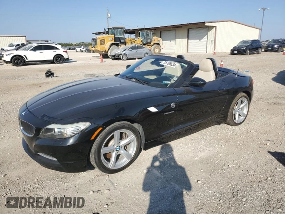 2012 BMW Z4 sDrive28i with VIN WBALL5C5XCE716711, listed as a Copart auction lot 75706534 with 89,948 mi miles and Clean Title. Bid and sale history available at carsss.com. Image 1.