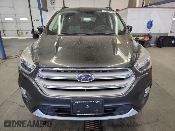2018 Ford Escape SE z VIN 1FMCU9GD0JUC61682, wystawiony jako Copart lot #59105625 z przebiegiem 85 146 mil mil oraz Czysty tytuł • Clean title. Historia ofert i sprzedaży dostępna na DreamBid. Obrazek 5.
