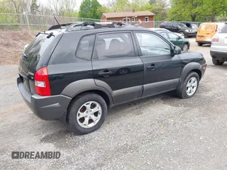 2009 Hyundai Tucson Limited with VIN KM8JN12D59U982332, listed as a IAAI auction lot 42044446 with 172,215 mi miles. Bid and sale history available at carsss.com. Image 4.