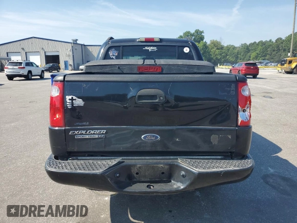 2004 Ford Explorer Sport Trac XLS with VIN 1FMZU67KX4UC35084, listed as a Copart auction lot 61967505 with 212,409 mi miles and Salvage title. Bid and sale history available at DreamBid. Image 6.
