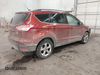 2014 Ford Escape SE with VIN 1FMCU9GXXEUD96930, listed as a IAAI auction lot 41574851 with 140,252 mi miles. Bid and sale history available at carsss.com. Image 4.