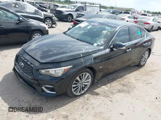 2020 Infiniti Q50 Sport z VIN JN1EV7AP1LM201269, wystawiony jako IAAI lot #42358333 z przebiegiem 69 368 mil mil oraz . Historia ofert i sprzedaży dostępna na DreamBid. Obrazek 2.