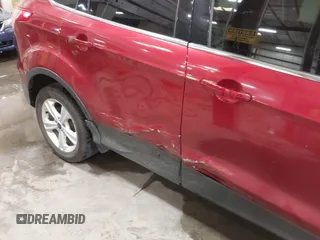 2014 Ford Escape SE z VIN 1FMCU9GX5EUA05294, wystawiony jako IAAI lot #42282028 z przebiegiem 119 046 mil mil oraz . Historia ofert i sprzedaży dostępna na DreamBid. Obrazek 6.