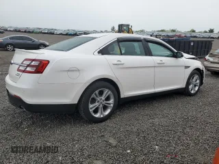 2016 Ford Taurus SEL z VIN 1FAHP2E87GG146931, wystawiony jako Copart lot #56135655 z przebiegiem 99 733 mil mil oraz Szkoda całkowita • Salvage title. Historia ofert i sprzedaży dostępna na DreamBid. Obrazek 3.