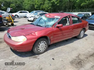 1999 Ford Contour SE with VIN 1FAFP6639XK100385, listed as a Copart auction lot 61484125 with 206,965 mi miles and Salvage title. Bid and sale history available at DreamBid. Image 1.
