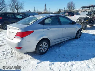 2016 Hyundai Accent SE with VIN KMHCT4AE5GU946079, listed as a IAAI auction lot 41635269 with 120,819 mi miles. Bid and sale history available at carsss.com. Image 4.