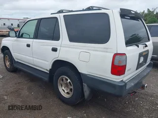 1998 Toyota 4Runner with VIN JT3GM84R5W0031171, listed as a IAAI auction lot 41989920 with 163,296 mi miles and . Bid and sale history available at DreamBid. Image 3.