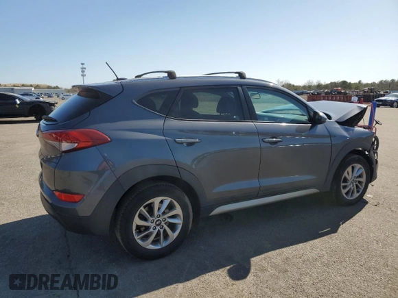 2017 Hyundai Tucson SE z VIN KM8J33A44HU376246, wystawiony jako Copart lot #52453345 z przebiegiem 97 306 mil mil oraz Szkoda całkowita • Salvage title. Historia ofert i sprzedaży dostępna na DreamBid. Obrazek 3.