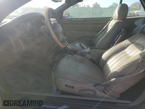 2004 Chrysler Sebring LXi z VIN 1C3EL55R74N121400, wystawiony jako Copart lot #80369614 z przebiegiem Nie podano mil oraz Nie do naprawy • Non repairable. Historia ofert i sprzedaży dostępna na DreamBid. Obrazek 7.