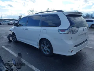 2014 Toyota Sienna SE with VIN 5TDXK3DC1ES422510, listed as a IAAI auction lot 41030376 with Not Provided miles and . Bid and sale history available at DreamBid. Image 3.