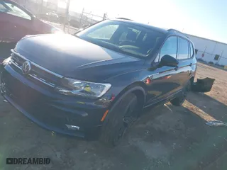2021 Volkswagen Tiguan SE with VIN 3VV2B7AX1MM111328, listed as a IAAI auction lot 41457622 with 30,236 mi miles. Bid and sale history available at carsss.com. Image 2.