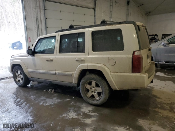2010 Jeep Commander Sport with VIN 1J4RG4GK2AC158450, listed as a Copart auction lot 46210865 with 222,500 mi miles and Salvage Title. Bid and sale history available at carsss.com. Image 2.
