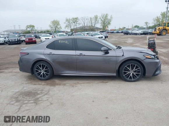 2023 Toyota Camry SE z VIN 4T1G11AK2PU088324, wystawiony jako IAAI lot #42173302 z przebiegiem 72 239 mil mil oraz . Historia ofert i sprzedaży dostępna na DreamBid. Obrazek 13.