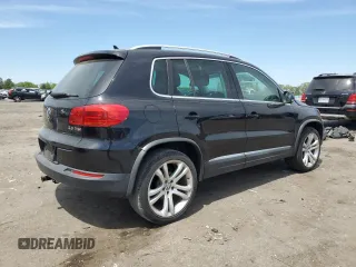2013 Volkswagen Tiguan SE z VIN WVGAV7AX4DW523112, wystawiony jako Copart lot #53261855 z przebiegiem 86 190 mil mil oraz Szkoda całkowita • Salvage title. Historia ofert i sprzedaży dostępna na DreamBid. Obrazek 3.