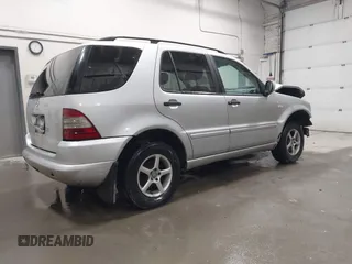 2000 Mercedes-Benz M 320/430/500 with VIN 4JGAB54E4YA199556, listed as a IAAI auction lot 42111380 with 155,061 mi miles and . Bid and sale history available at carsss.com. Image 4.